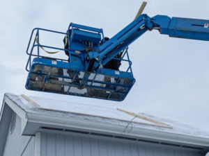 roofing contractor in Alaska doing emergency roof repair