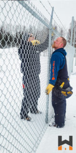 commercial chain link fence with barbed wire by top contractor in Alaska