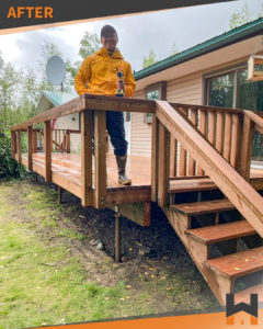 A Working Hands customer is all smiles after his house deck was renovated