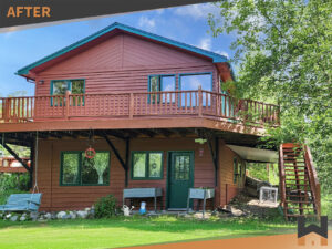 Freshly painted home exterior with green trim and natural wood tones